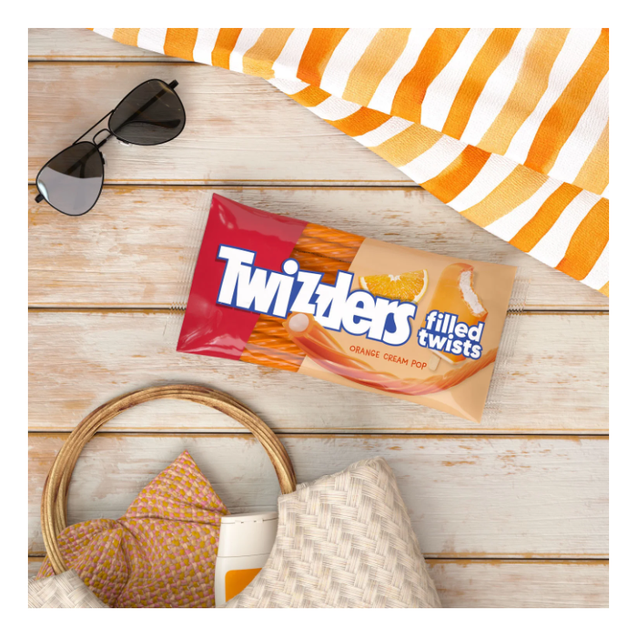 Product image of Twizzlers Filled Twists Orange Cream Pop Flavored Licorice Style Candy, Bag 11 oz